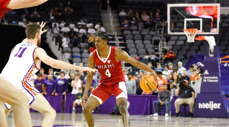 Miami's Darweshi Hunter vs. Evansville in Monday's season opener. Megan Walker/CONTRIBUTED