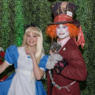 The eighth annual sold-out Dayton Adult Prom happened at the Dayton Arcade in downtown Dayton on Saturday, Feb. 28, 2026. Hosted by Liftoff Entertainment and Dayton Arcade Events, proceeds from the prom went to directly benefit Ronald McDonald House Charities Dayton. This year’s prom theme was “A Night in Wonderland” (Alice in Wonderland). TOM GILLIAM / CONTRIBUTING PHOTOGRAPHER