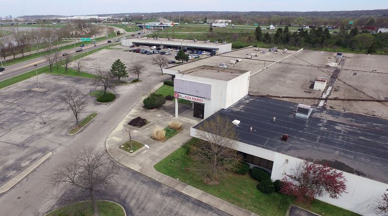 The former Carrollton Plaza site is seen as a key to the city’s plans for the Miami Bend Entertainment District, which is located adjacent to the Great Miami River with immediate access to Interstate 75. TY GREENLEES / STAFF
