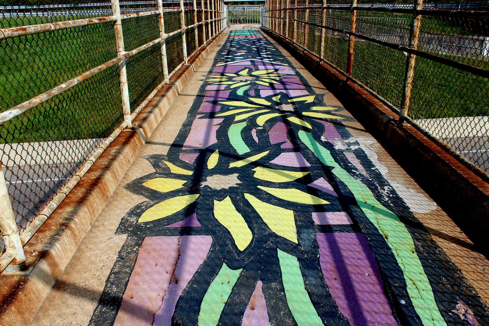 The US 35 pedestrian bridge  between South Park and the Oregon District was painted by upDayton volunteers in 2012.