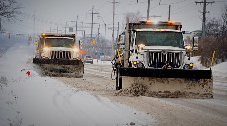 Beavercreek Road crews were out working early Thursday morning, Feb. 18, 2021 on Colonel Glenn Highway. MARSHALL GORBY\STAFF