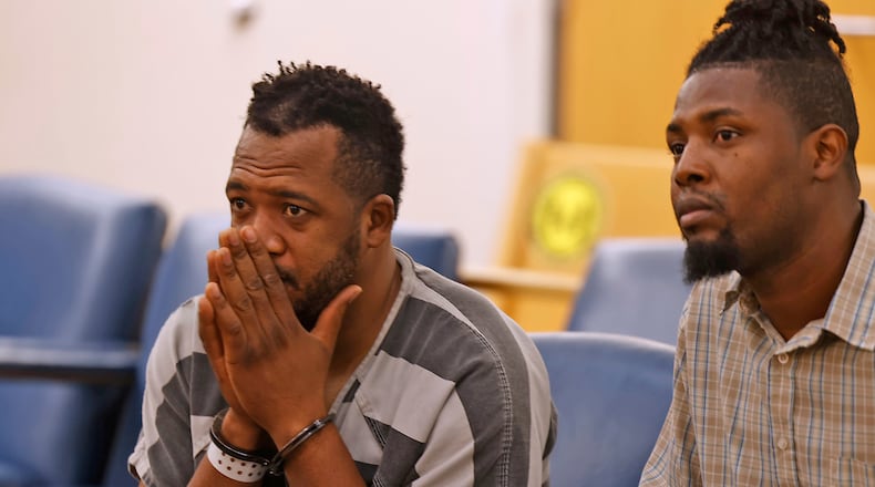 Hermanio Joseph, left, sits with interpreter Sony Auguste as he's arraigned in Clark County Municipal Court Thursday, Aug. 24, 2023. Joseph now is charged with vehicular homicide and involuntary manslaughter in the fatal Northwestern school bus crash on Aug. 22. BILL LACKEY/STAFF