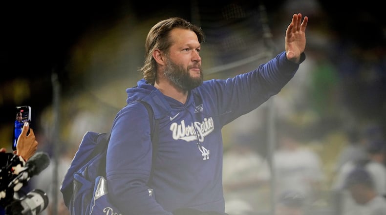 Los Angeles Dodgers pitcher Clayton Kershaw waves after their loss against the Toronto Blue Jays in Game 5 of baseball's World Series, Wednesday, Oct. 29, 2025, in Los Angeles. (AP Photo/Brynn Anderson)