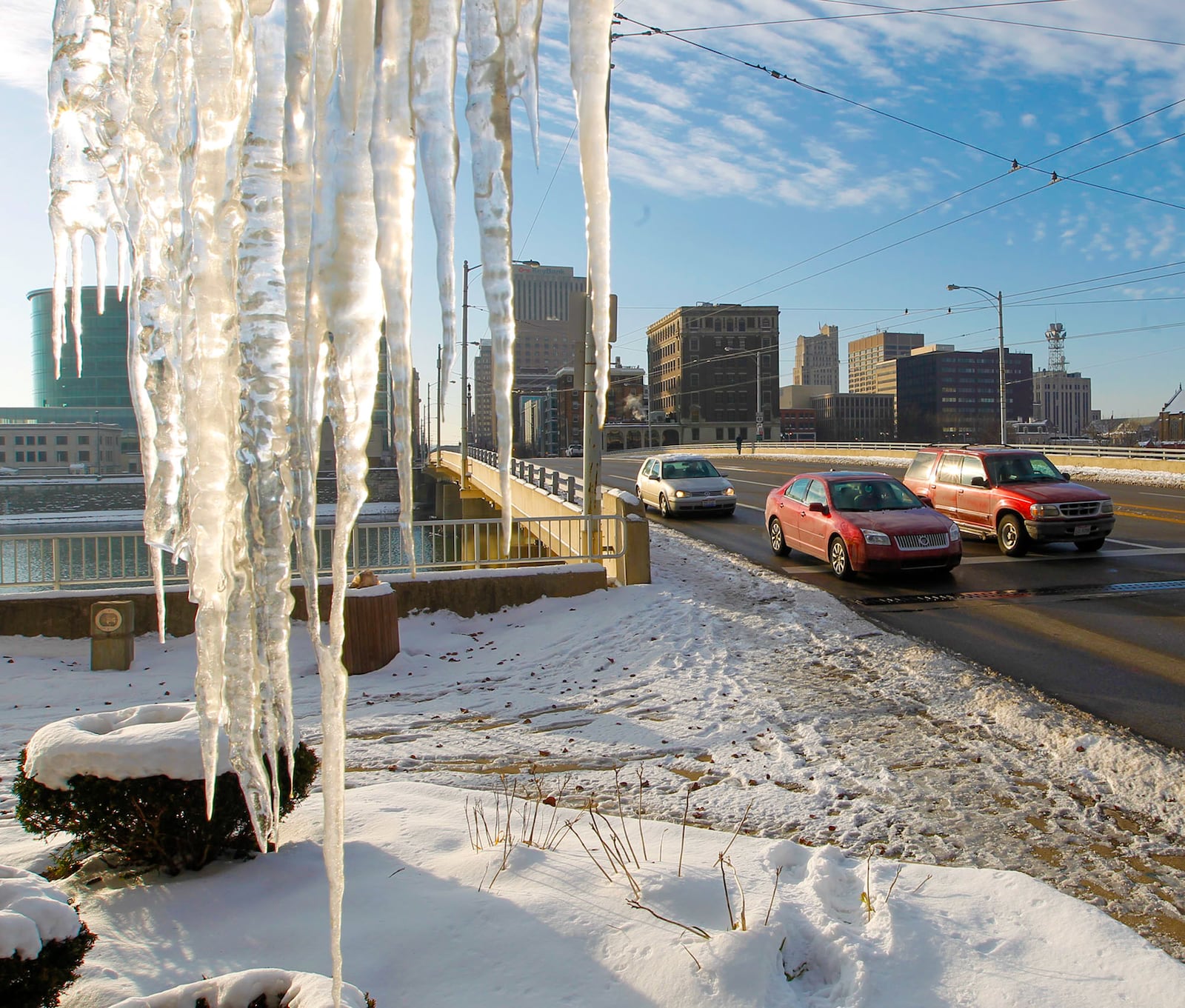 Icicles hanging from 2 Riverplace along N. Main St. reflect the cold temperatures felt throughout the Dayton area.   TY GREENLEES / STAFF