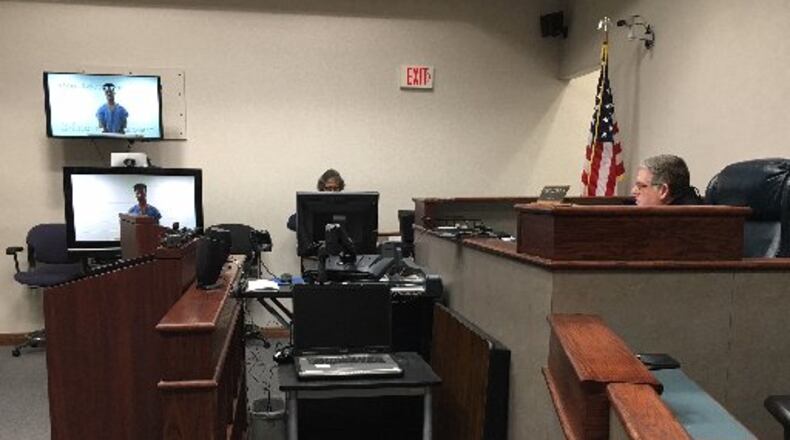 Caleb W. Johnson, the only adult charged in the Huber Heights armed robbery, was arraigned by video camera last week.