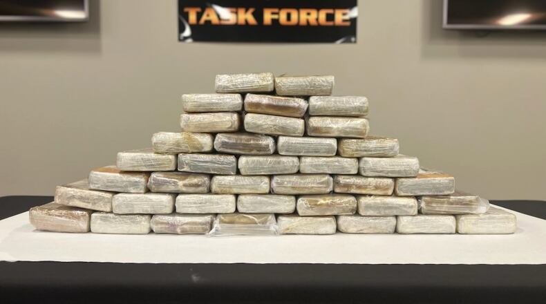 Bricks of suspected drugs stacked on a table, according to FBI Cincinnati.
Photo courtesy / FBI Cincinnati.