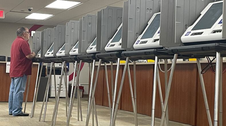 A voter casts his ballot Thursday morning at the Montgomery County Board of Elections office, which has reported low turnout this primary season.