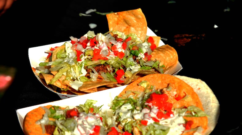 Tacos and Nachos took center stage at Austin Landing's inaugural Taco & Nacho Fest on Saturday, Aug. 27 2022. Tacos and Nachos of all varieties were served up by approximately 15 vendors during the event which also featured live entertainment along with other foods and drinks. DAVID A. MOODIE/CONTRIBUTING PHOTOGRAPHER