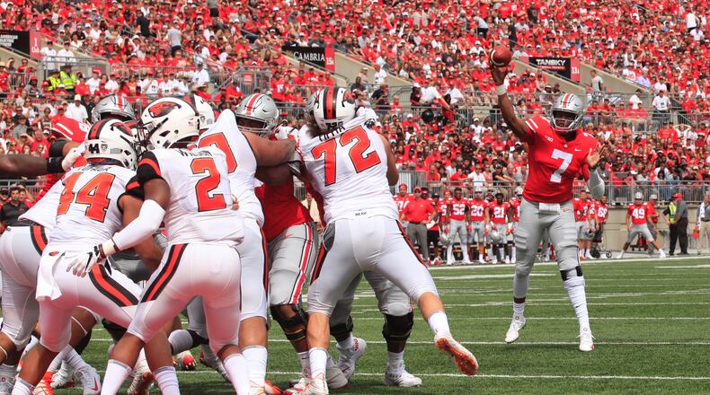 Ohio State’s Dwayne Haskins throws a touchdown pass to Terry McLaurin in the first quarter against Oregon State on Saturday, Sept. 1, 2018, at Ohio Stadium in Columbus. David Jablonski/Staff