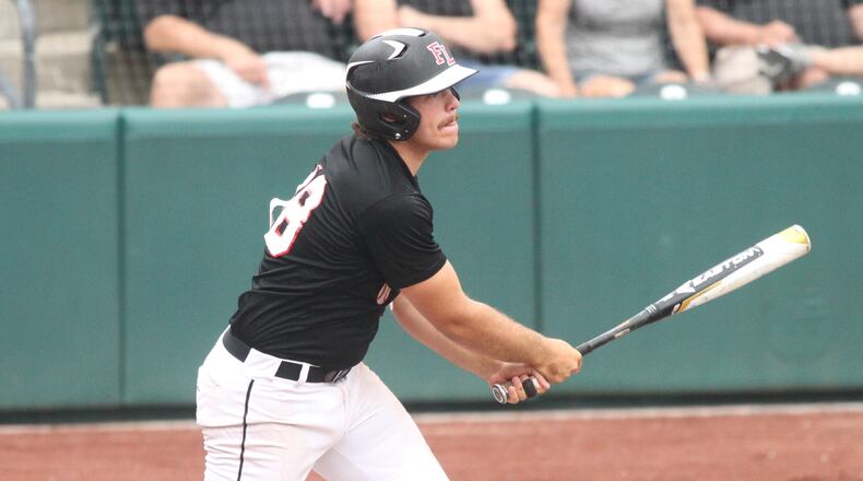 Fort Loramie’s C.J. Billing triples in the sixth inning to drive in the tying run against Trinity in a Division IV state semifinal on Thursday, May 31, 2018, at Huntington Park in Columbus. David Jablonski/Staff