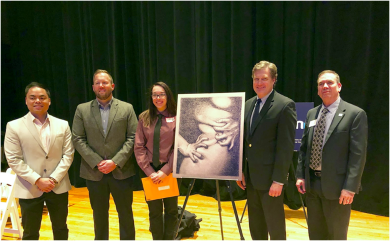From left to right: Jonathan Quiling, Jason Kershner, Chase Solberg, Congressman Turner, and Dr. Jerry Smith recognize “Don’t Panic” with third place honors for the 2019 Congressional Art Competition