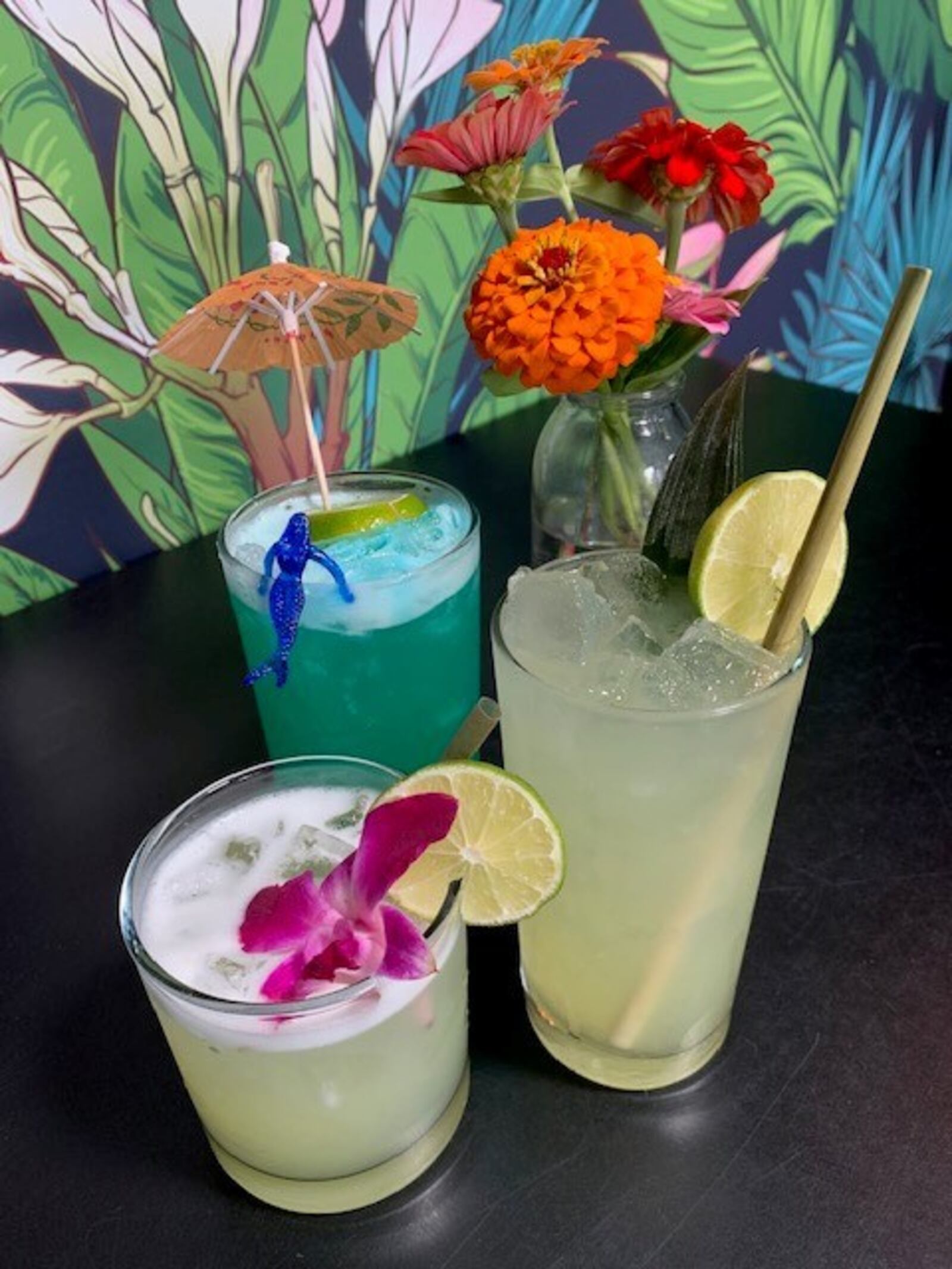 Lily's Bistro in Dayton's Oregon District is finishing its transformation to Lily's Dayton. The new concept, "Good Food, Tasty Cocktails," will blend some of Lily's familiar favorites with a more affordable menu and cocktail list and offers a tiki-inspired theme. ALEXIS LARSEN/CONTRIBUTED PHOTOS