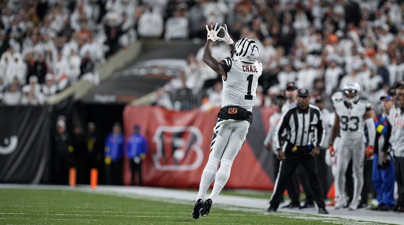 Cincinnati Bengals wide receiver Ja'Marr Chase (1) makes a catch during an NFL football game against the Miami Dolphins, Sept. 30, 2022, in Cincinnati. JEFF DEAN/AP