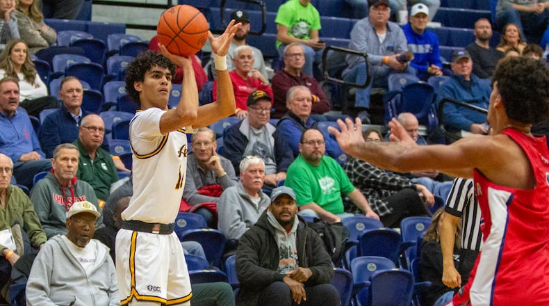 Alter guard R.J. Greer shoots a 3-pointer during the first half in last year's Flyin' To The Hoop at Trent Arena. Jeff Gilbert/CONTRIBUTED