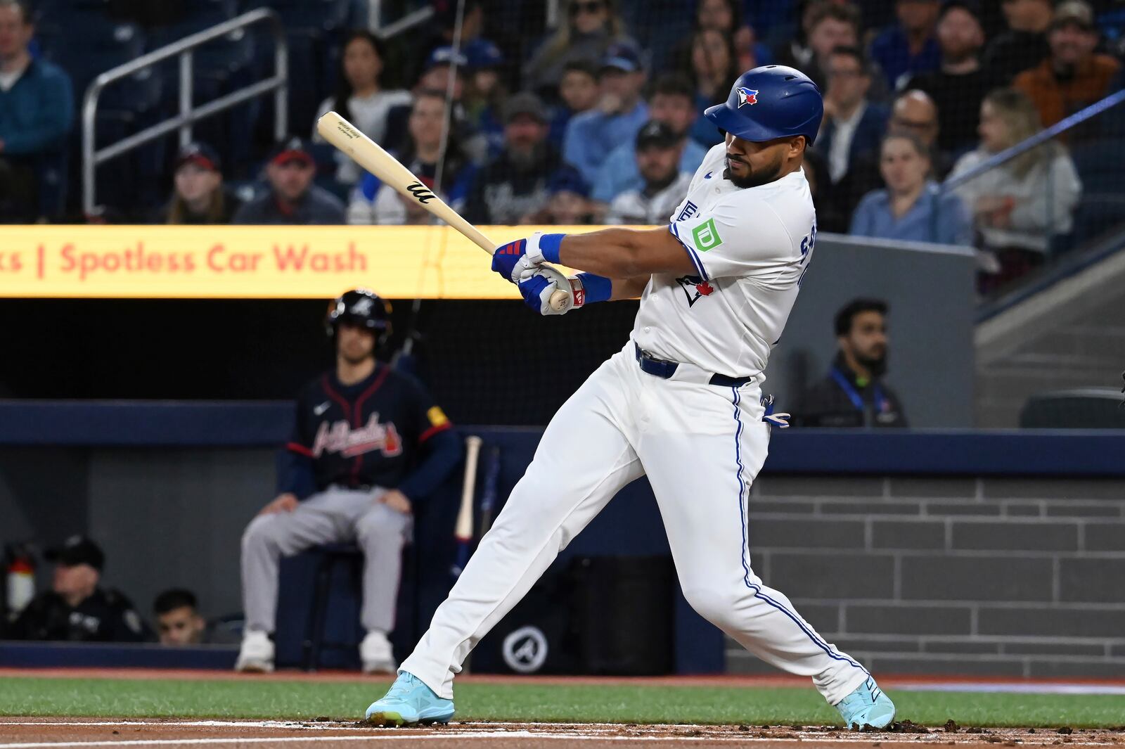 Toronto Blue Jays' Anthony Santander hits a double against the Atlanta Braves in first inning baseball action in Toronto on Wednesday, April 16, 2025. (Jon Blacker/The Canadian Press via AP)