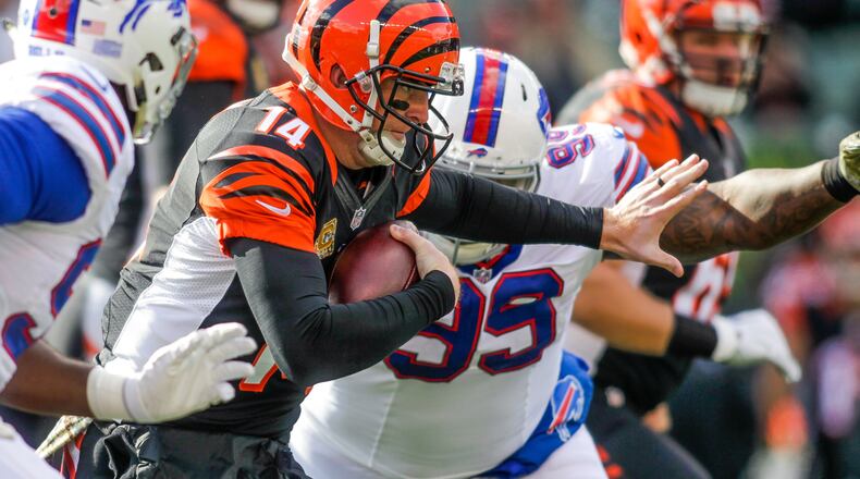 Cincinnati Bengals quarterback Andy Dalton carries the ball during their 16-12 loss to the Buffalo Bills Sunday, Nov. 20 at Paul Brown Stadium in Cincinnati. NICK GRAHAM/STAFF