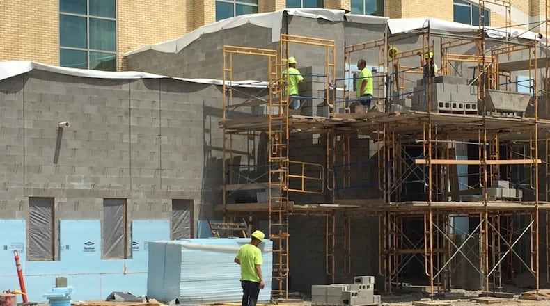 Workers added a second entrance to Hobart Arena in Troy in 2016. Because of budget reductions, the city of Troy will not replace a side roof on the arena in 2020.