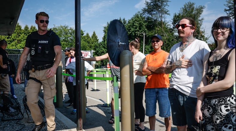 Marijuana fans line-up to enter Pure Ohio on Needmore Road in Harrison Twp. Tuesday the first day of recreation marijuana sales. Jim Noelker/Staff