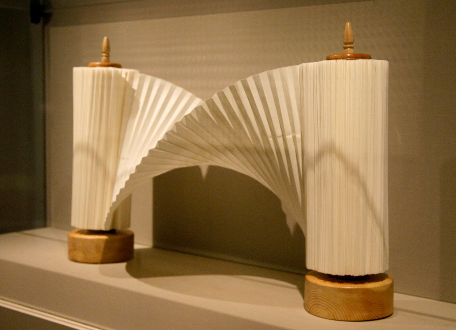 Mira Golan's "The Twisted Holy Scroll," one of the pieces in the Dayton Art Institute origami exhibit, “Above the Fold: New Expressions in Origami” . LISA POWELL / STAFF