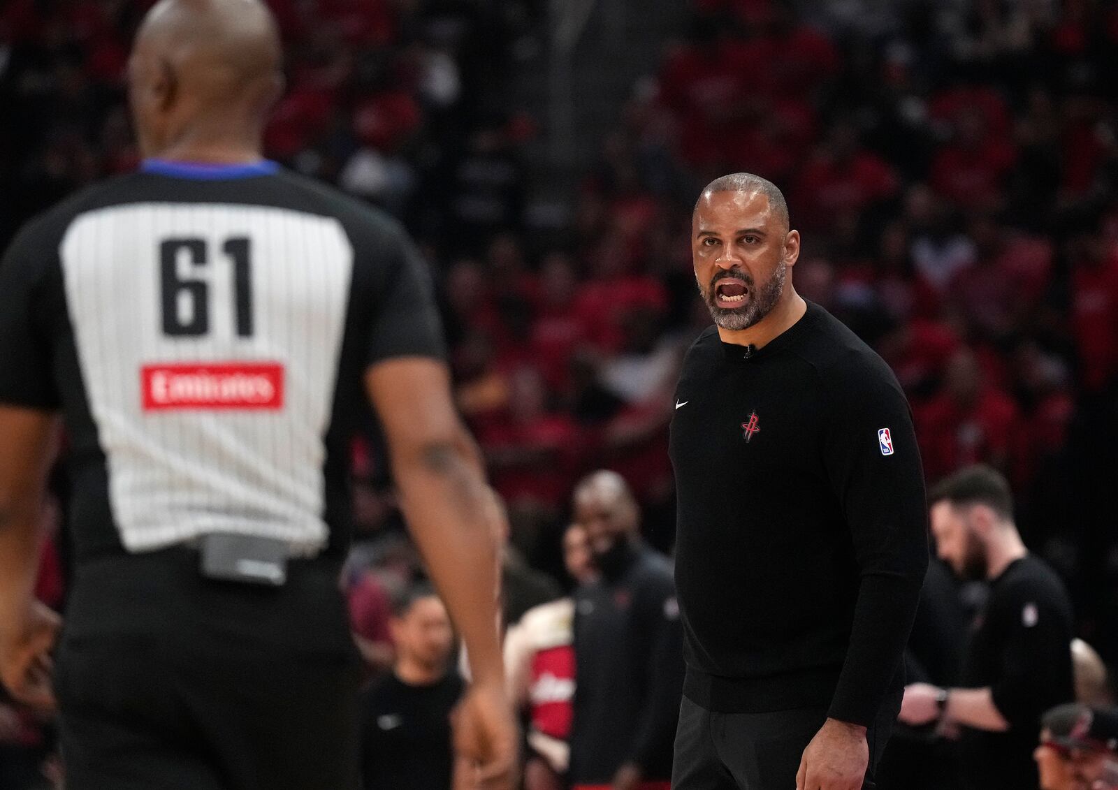 Houston Rockets head coach Ime Udoka talks to official Courtney Kirkland after a call during the first half of Game 2 of an NBA basketball first-round playoff series against the Houston Rockets in Houston, Wednesday, April 23, 2025. (AP Photo/Karen Warren)
