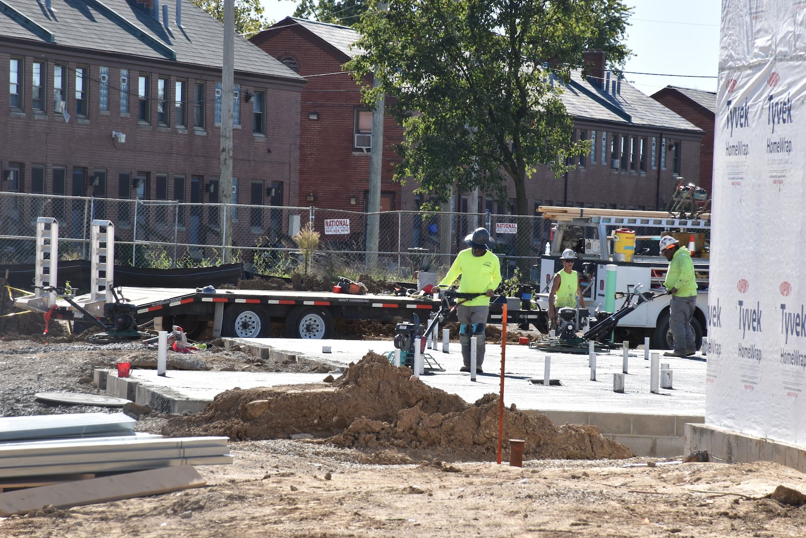 Crews construct new apartments at the DeSoto Bass Courts in West Dayton. Greater Dayton Premier Management, the local public housing authority, has torn down some of the DeSoto Bass units, which were built in the 1940s. CORNELIUS FROLIK / STAFF
