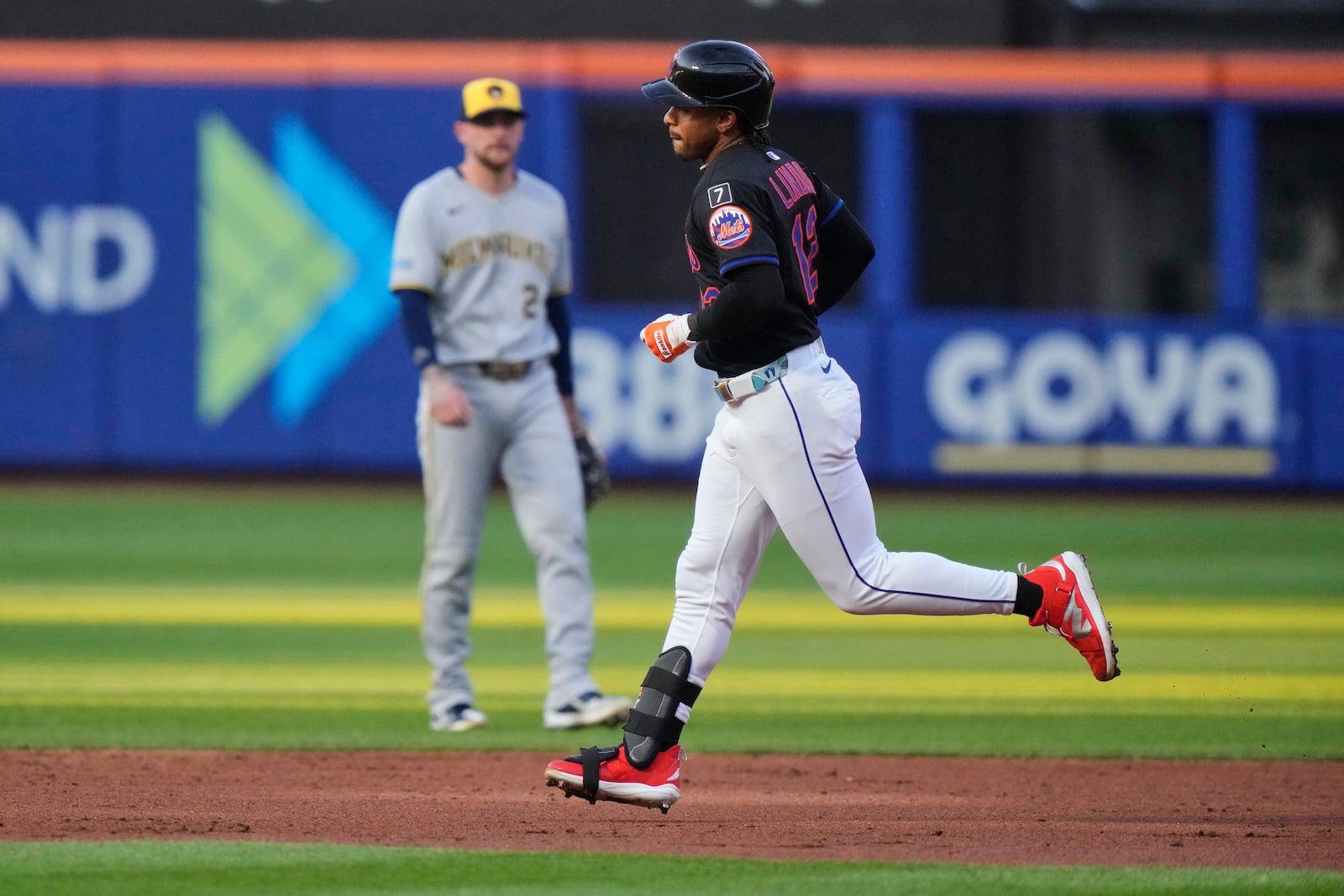 New York Mets' Francisco Lindor (12) runs the bases after hitting a home run during the second inning in the second baseball game of a doubleheader against the Milwaukee Brewers Wednesday, July 2, 2025, in New York. (AP Photo/Frank Franklin II)