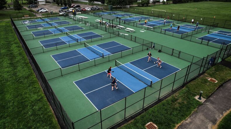 Pickleballers from all over the Miami Valley have more courts to enjoy at J.F. Kennedy Park in Kettering. JIM NOELKER/STAFF
