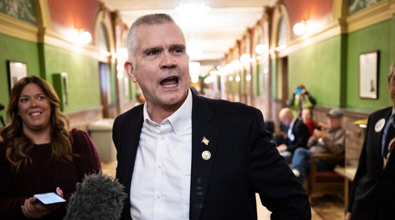 FILE - U.S. Rep. Matt Rosendale, R-Mont., speaks with reporters after filing to run for the U.S. Senate on Friday, Feb. 9, 2024 in the Montana State Capitol in Helena, Mont. Rosendale announced Friday, March 8, he would no longer be seeking re-election — the second time he's filed and dropped out of a congressional race in the past month. (Thom Bridge/Independent Record via AP, File)