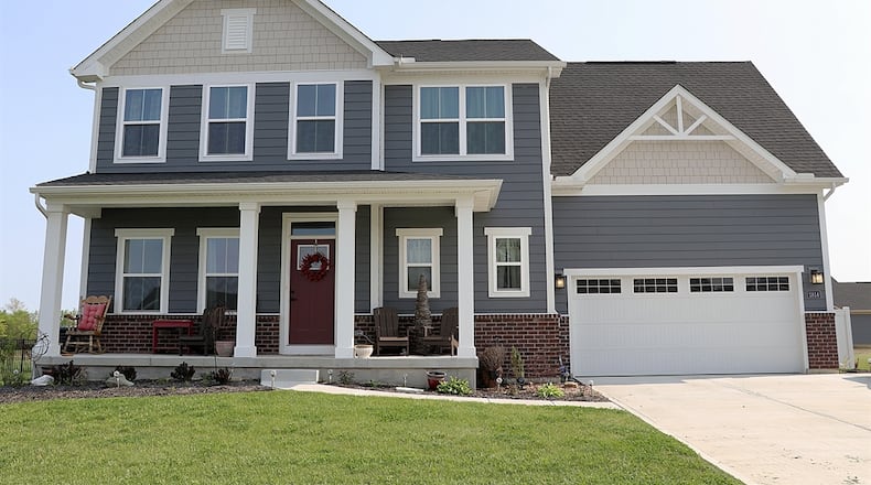Built in 2021, the wood-plank and brick home at 2814 New Castle Drive offers about 3,681 square feet of living space. Contributed photos by Kathy Tyler