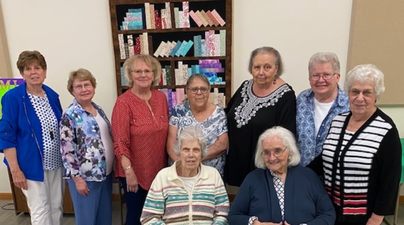 Miami Book Club 125th anniversary celebration.
Standing, left to right:
Kathy Edwards
Patt Gibson
Debbie Hounshell
Nancy Becker
Becky Hedges-Kamps
Jean Back
Wilma Zeigler, President
Front Seated, left to right:
Beth Crout
Mary Wilham