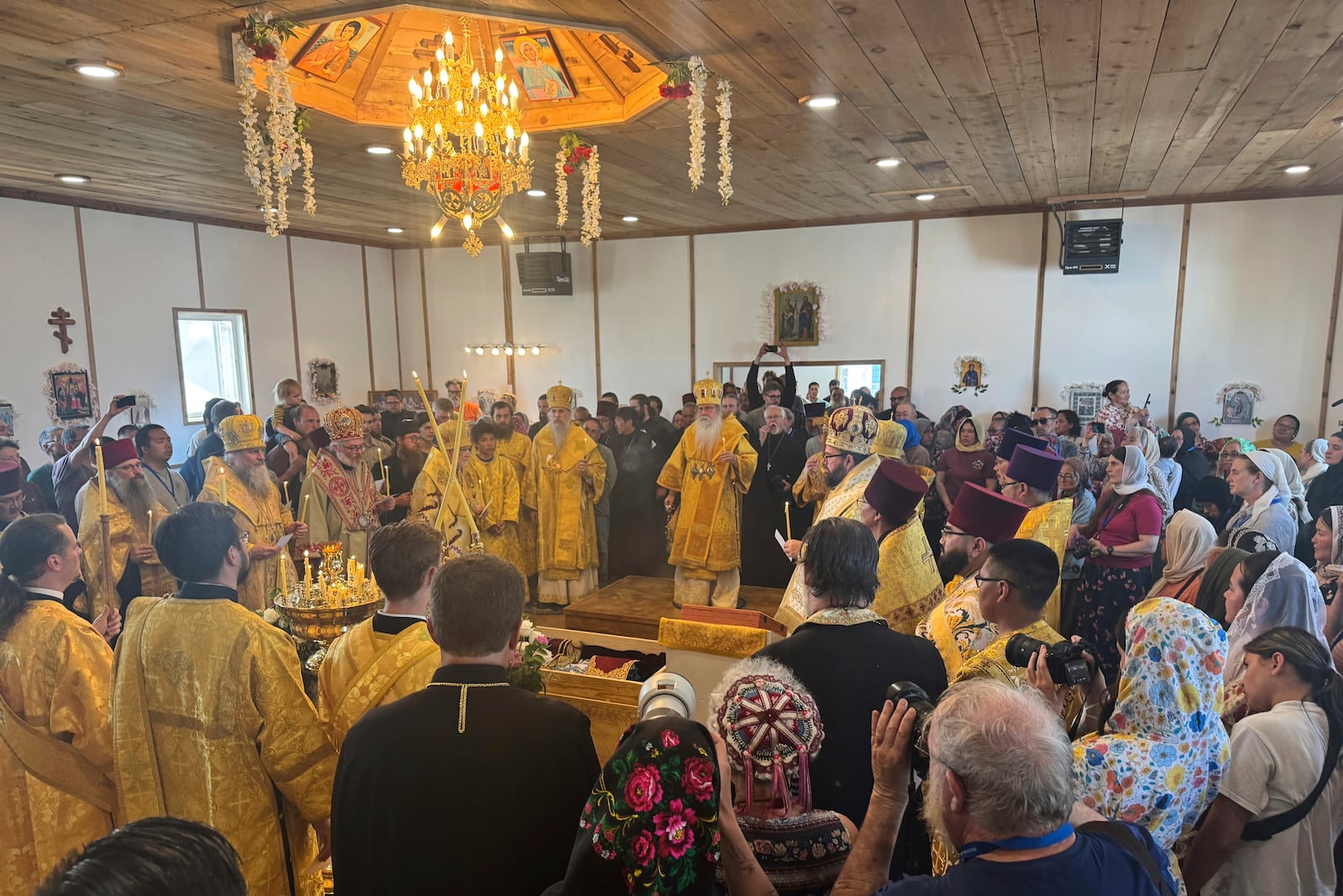Worshippers fill St. Nicholas Orthodox Church in Kwethluk, Alaska, on June 19, 2025, for the canonization ceremony of St. Olga, the first female Orthodox saint in North America. (AP Photo/Mark Thiessen)