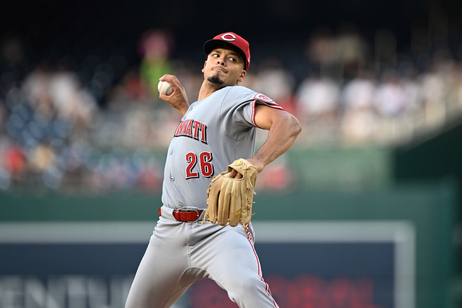 Cincinnati Reds pitcher Chase Burns (26) throws during the second inning of a baseball game against the Washington Nationals in Washington, Tuesday, July 22, 2025. (AP Photo/Terrance Williams)
