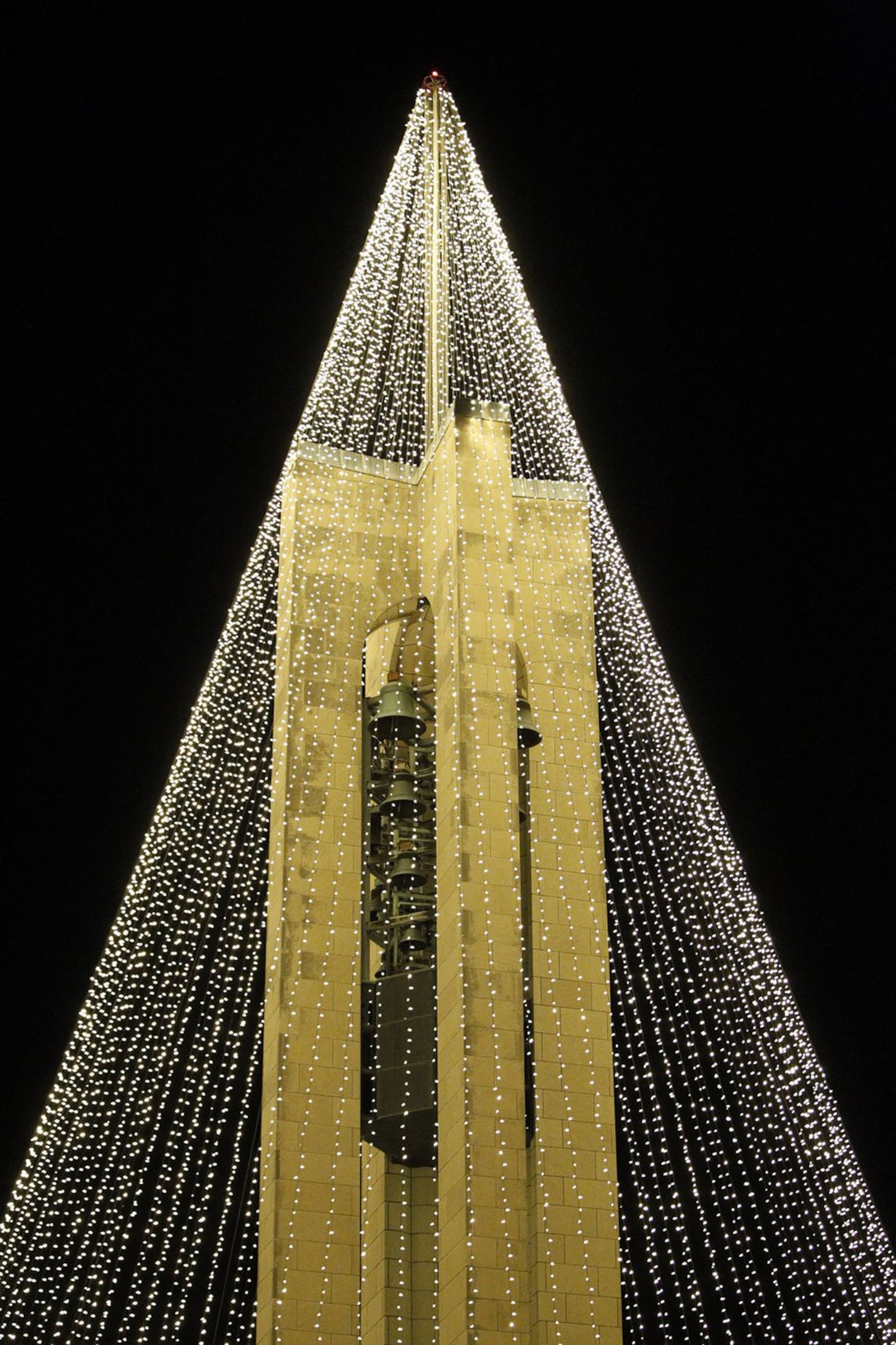Dayton History has transformed the Deeds Carillon at Carillon Park into a huge lighted Christmas Tree. The Carillon will be illuminated on Nov. 30 this year. TY GREENLEES / STAFF