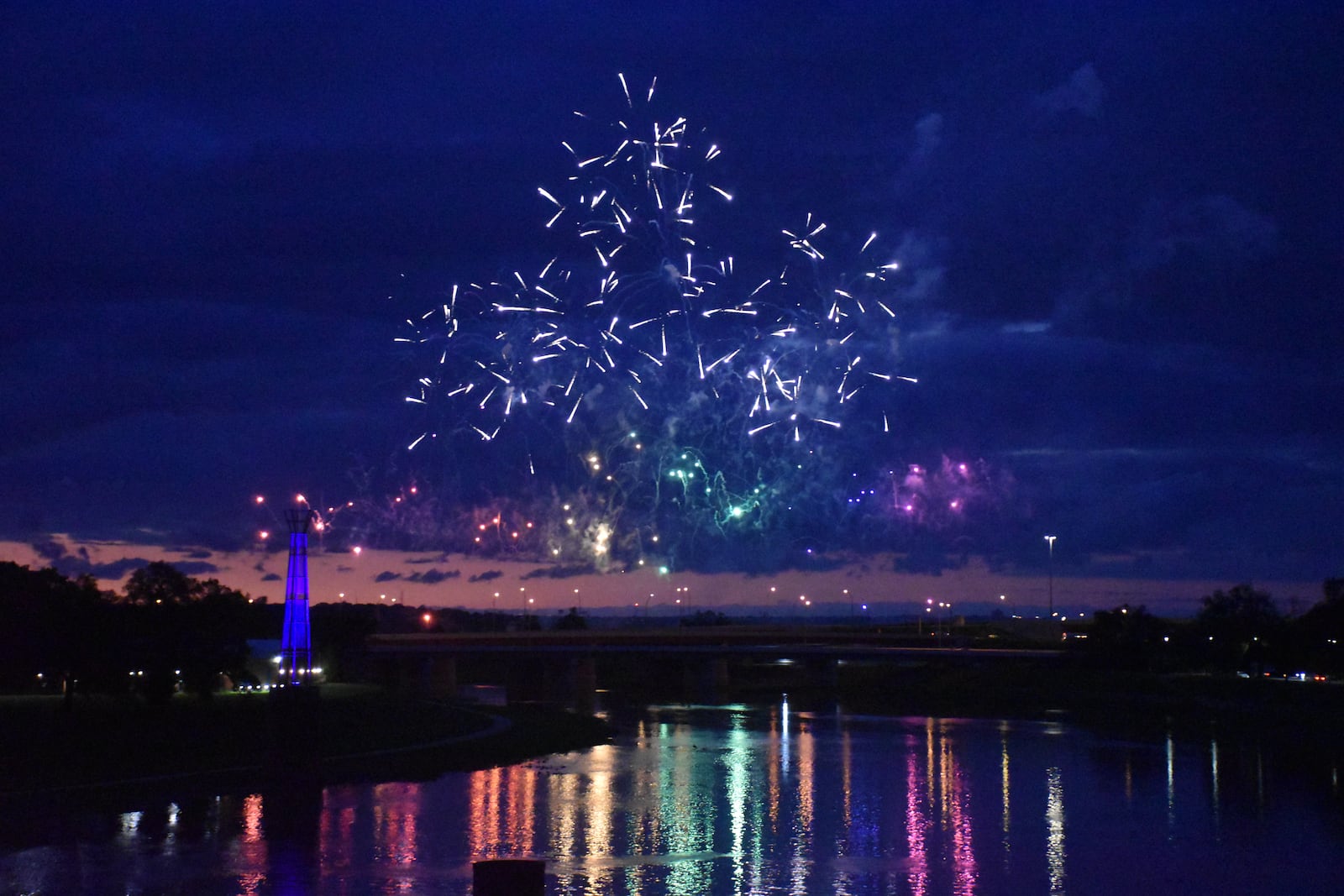 Colorful fireworks lit up the night sky north of downtown Dayton as part of the NATO Parliamentary Assembly taking place in downtown. CORNELIUS FROLIK / STAFF