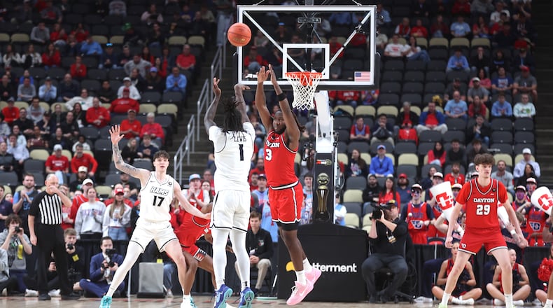 Virginia Commonwealth's Nyk Lewis makes a 3-pointer against Dayton on the first possession in the Atlantic 10 Conference championship game on Sunday, March 15, 2026, at PPG Paints Arena in Pittsburgh. David Jablonski/Staff