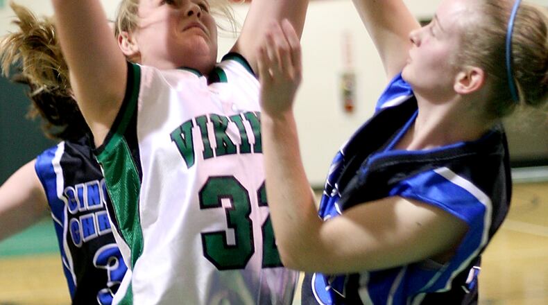 New Miami’s Amberly Rison attempts a shot during a 2007 game against visiting Cincinnati Christian. JOURNAL-NEWS FILE PHOTO