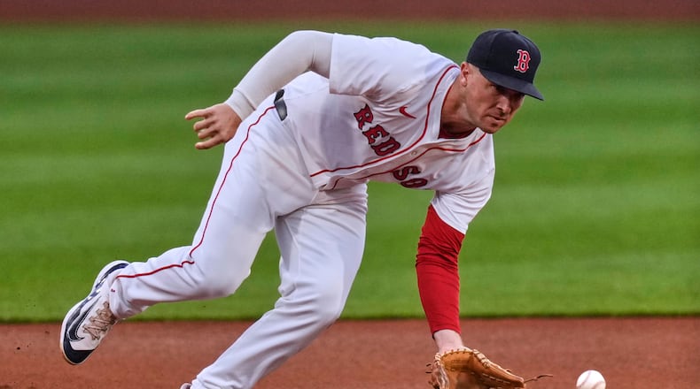 FILE - Boston Red Sox third baseman Alex Bregman fields a groundout hit by Baltimore Orioles' Jordan Westburg during the first inning of a baseball game at Fenway Park, on Aug. 18, 2025, in Boston. (AP Photo/Charles Krupa, File)