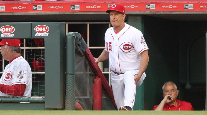 Reds interim manager Jim Riggleman watches a game against the Mets on Monday, May 7, 2018, at Great American Ball Park in Cincinnati. David Jablonski/Staff