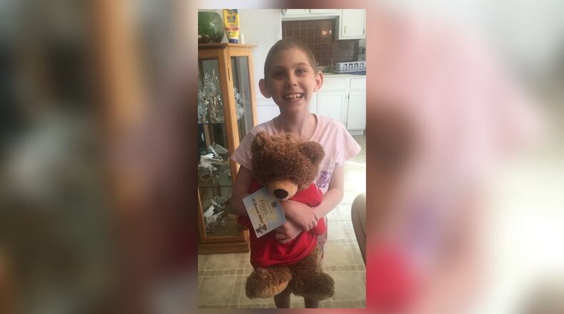 Alexis Lanning with her Special Wish Foundation-Dayton Bear. CONTRIBUTED