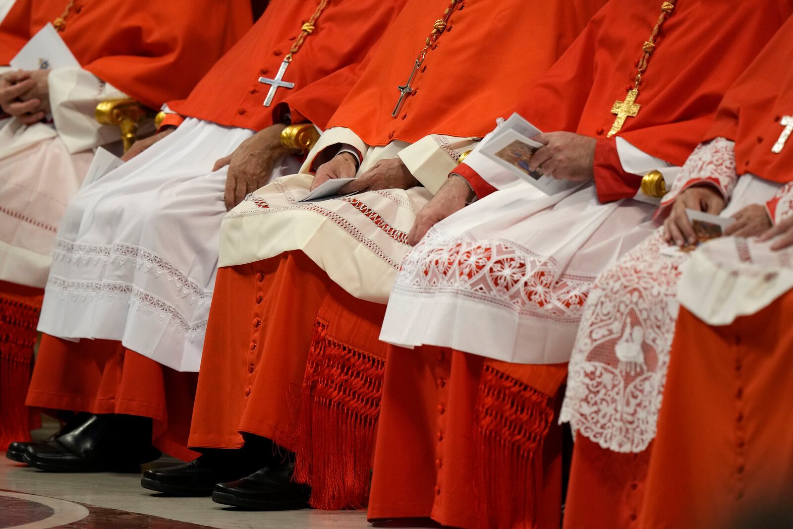 FILE - New Cardinals sit during consistory inside St. Peter's Basilica, at the Vatican, Saturday, Aug. 27, 2022. (AP Photo/Andrew Medichini, File)