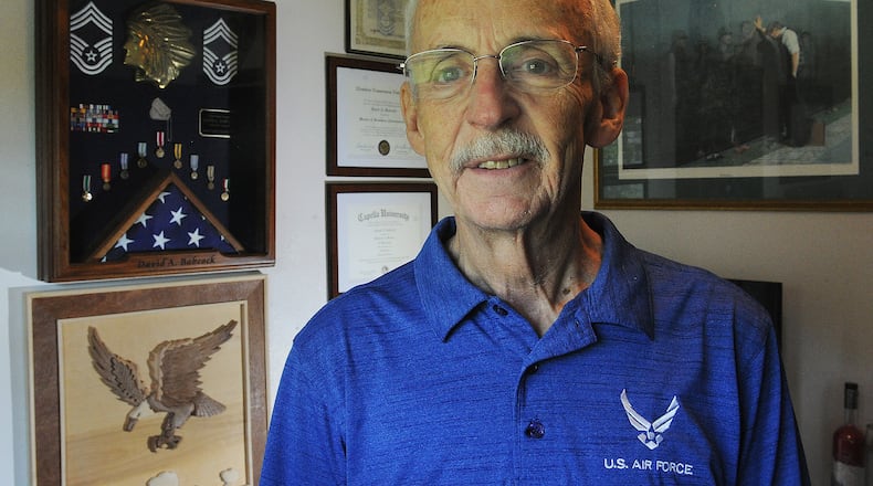 Air Force veteran Dave Babcock at his home in Enon. MARSHALL GORBY\STAFF