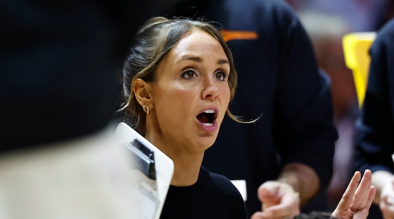 Tennessee head coach Kim Caldwell talks to her players during a timeout in the first half of an NCAA college basketball game against Vanderbilt in Knoxville, Tenn., Sunday, March 1, 2026. (AP Photo/Wade Payne)