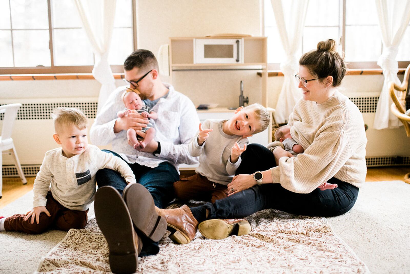 Kyle and Mari with their four children in their home. Photo contributed by Mari Foster.