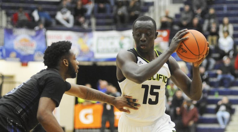 Prolific’s Alimamy Koroma (with ball). Prolific Prep (Calif.) defeated IMG Academy (Fla.) 75-71 in the 16th annual Premier Health Flyin’ to the Hoop at Trent Arena in Kettering on Sat., Jan. 13, 2018. MARC PENDLETON / STAFF