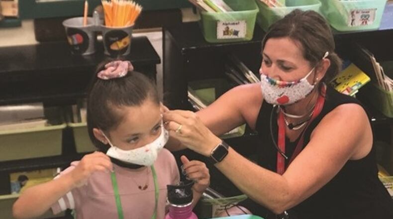 Troy City Schools are shifting to its hybrid learning plan beginning Monday because Miami County has the sixth-highest COVID-19 infection rate per capita in Ohio. CONTRIBUTED