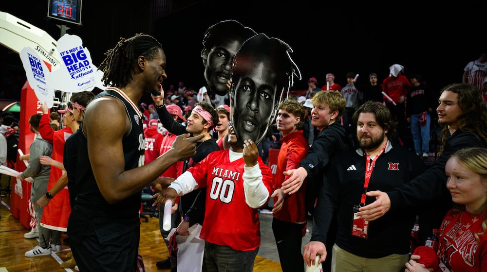 Miami University's Antwone Woolfolk talks with his fans after the RedHawks beat Bowling Green 91-77 on Friday, Feb. 20, 2026 at Millett Hall in Oxford. JEREMY MILLER / CONTRIBUTED PHOTO