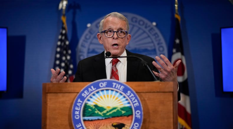 Ohio Gov. Mike DeWine speaks during a news conference, Friday, Dec. 29, 2023, in Columbus, Ohio. DeWine vetoed a measure Friday that would have banned gender-affirming care for minors and transgender athletes’ participation in girls and women’s sports, in a break from members of his party who championed the legislation. (AP Photo/Carolyn Kaster)