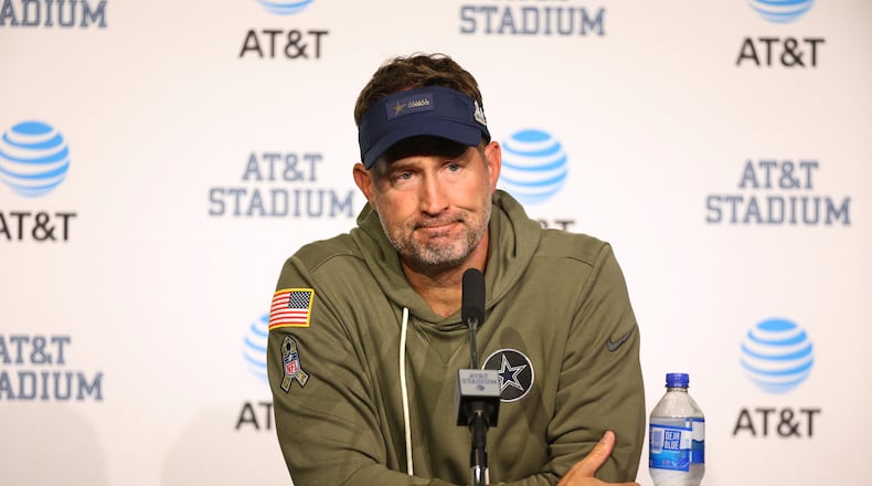Dallas Cowboys head coach Brian Schottenheimer takes questions during a news conference after an NFL football game against the Arizona Cardinals Monday, Nov. 3, 2025, in Arlington, Texas. (AP Photo/Richard Rodriguez)