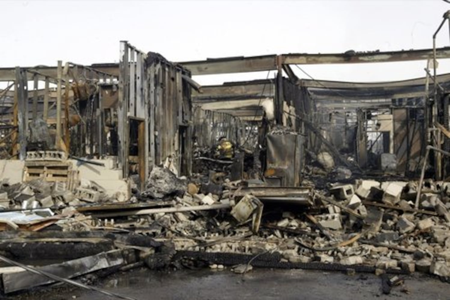 Page Manor shopping center damaged by fire