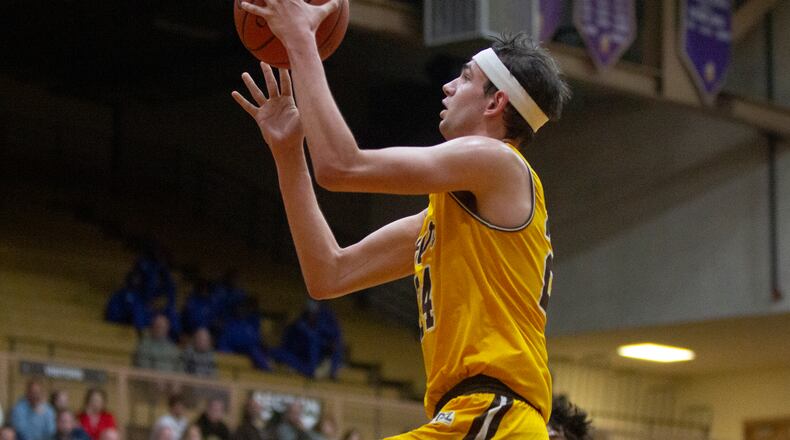 Alter's Jacob Conner goes in for a layup against Linden McKinley during the first half of Thursday night's Division II regional semifinal at Vandalia Butler. Alter won 60-53. Jeff Gilbert/CONTRIBUTED